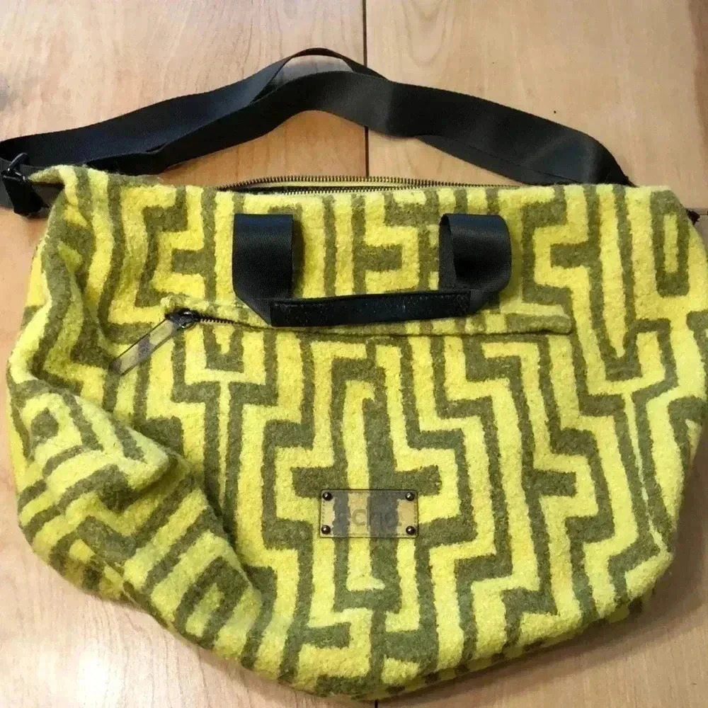 Echo brand felt tote. Lucite hardware.